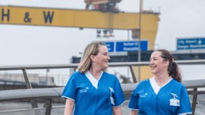 Two Leadcare Nurses walking outside H&W in Belfast Northern Ireland 