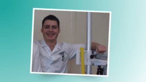 Paul Strachan in white nursing uniform