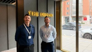Leadcare Recruitment Directors Stephen Ferguson and Paul Strachan standing in front of their new Belfast office The Kelvin