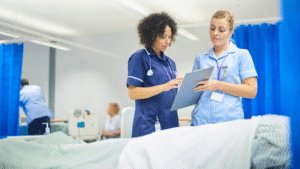 Two female nurses working long shift